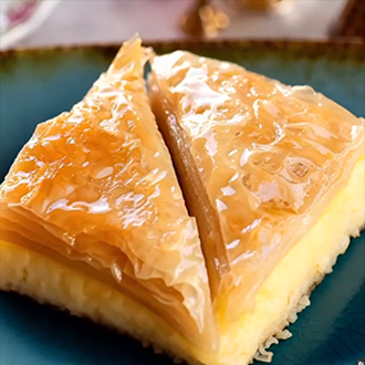 Greek Custard Pie (Galaktoboureko) with golden phyllo pastry and syrup